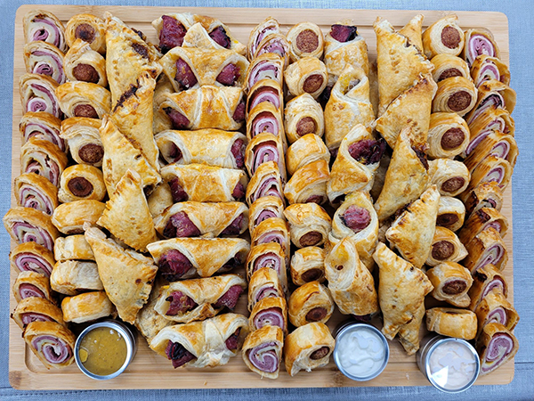 Appetizer Board - Large - includes deli roll, franks in blanks, pastrami danish, and pulled brisket bourekas / Size: 19