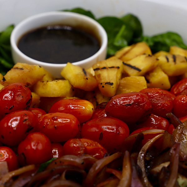 Hawaiian Salad - Grilled Pineapple, Grape Tomatoes & Red Onions On Spring Mix - Teriyaki Dressing