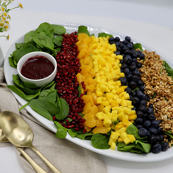 Mango & Apple Salad On A Bed Of Spinach Leaves With Honey Glazed Pecans & Craisens/Pom Seeds - Raspberry Dressing