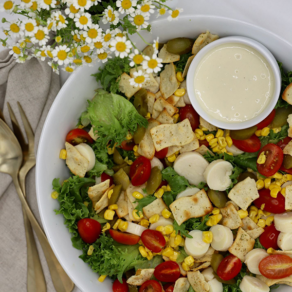 Nish Nosh Salad - Hearts Of Palm, Pickles, Sweet Corn, Cherry Tomatoes On Romaine With Nish Nosh Crackers - Nish Nosh Dressing