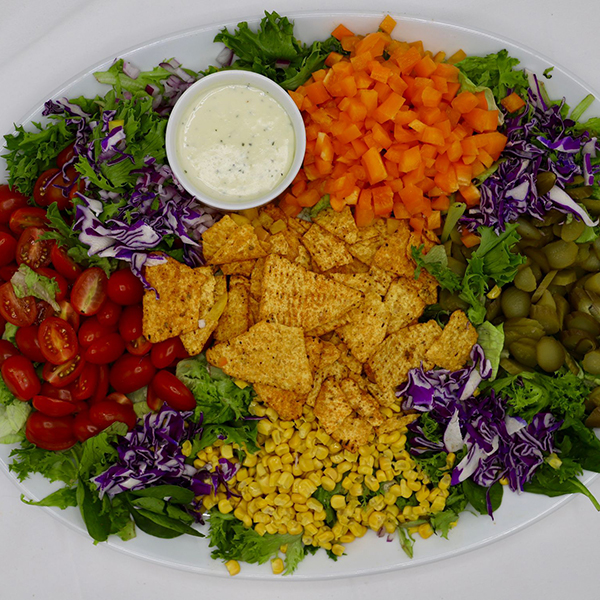 Taco Salad - Bed Of Romaine, Tomatoes, Pickles, Peppers, Corn, Purple Onion & Taco Chips - Garlic Mayo Dressing